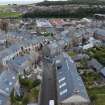 Oblique aerial view from north-west showing Historic Burgh and Harbour and Victorian Expansion Areas of Townscape Character, Eyemouth