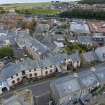 Oblique aerial view from west-north-west showing Historic Burgh and Harbour and Victorian Expansion Areas of Townscape Character, Eyemouth