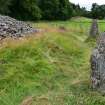 Digital photograph of panel in context with scale, from Scotland's Rock Art project, Corrimony 2, Highland