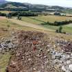 Excavation photograph, Mid-ex plan overview, taken from SE, Tinnis Castle, Drumelzier