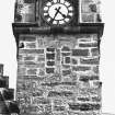 Tower, north west elevation, detail of blocked window with 1722 datestone lintel