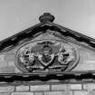 Detail of heraldic plaque.