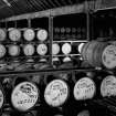 Ardbeg Distillery.
Interior of bonded warehouse showing traditional method of stacking casks.