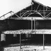 North section: cast-iron roof-trusses exposed by partial demolition