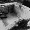Excavation photograph showing the cold bath with steps.