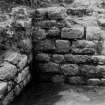 Excavation photograph: residence, room no. 5, masonry of SW corner.