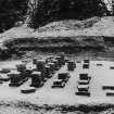 Excavation photograph: the hypocaust, at W end, looking S.