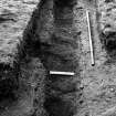 Excavation photograph showing the E wall of granary II.