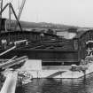 'Tomnahurich Bridge Inverness...'. View of tail end and deck under construction
d:'1/8/38'
Photographed by P Craigie Fleming, Friars' Street, Inverness
copy of B91719/PO