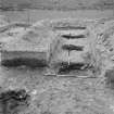 Excavation photograph - North gate, east side of east tower, looking north.
Glass plate negative.