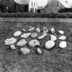 Excavation photograph. Querns, Stone Vessels, Worked Stones, etc. Copied from original in possession of Lord Strathnaver.