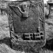 Kilbrannan Chapel, McKinnin Tombstone.
Detail of McKinnin tombstone in churchyard, dated 1793, with a ploughman and plough team.