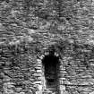 Detail of West wall of Keep showing window embrasure at first floor level and blocked embrasure at second floor level