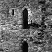 General view of doorways to latrine tower in interior of West curtain wall