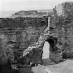 Castle Sween, interior.
General view of stairway in interior of courtyard.