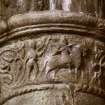 S choir-arcade, first column from W, showing foot soldier following mounted warrior.