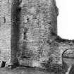 View of North Curtain exterior.
Detail of sandstone quoins of building, gunloops with blocked window, cross slit and flanking features at first floor level.
Garderobe outlet in Keep.