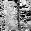 Detail of latrine in North East Tower, East Range.