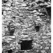 Castle Sween, interior.
Detail of oven, flue and fireplace corbels in North Extension.