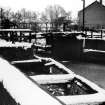 General view of Craigmarloch drawbridge on Forth and Clyde Canal and remains of bascule bridge.