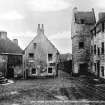 View of The Cross from the North East.
insc. 'The Cross, Oldest House and Bishop Leighton Study, Culross' 
(postcard, JB White Ltd. Dundee, 'The Best of All' series)