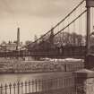 Historic photograph showing general view of suspension bridge.