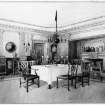 Photographic copy of watercolour of dining room.
Mount insc: 'Treatment for dining room painted white', 'Chippendale furniture in mahogany'.
Signed: 'Waring and Gillow Ltd., 76 Oxford Street, London'.