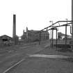 View from East showing No. 1 & 2 shaft horizontal steam winding engine houses, and steam service pipes, Barony Colliery