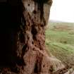 View from inside of entrance to E cave, showing inscribed markings.