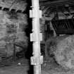Edenwood Steading: Detail of cast-iron post with rail brackets in covered cattle court