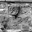 Detail of 1629 lintel and heraldic skewput.