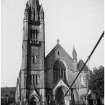 Scanned image of Free North Church of Scotland.
View of facade from suspension footbridge.