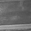 Detail of maker's name on cast iron stove on Ground Floor of main block