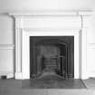 Interior-detail of chimneypiece on South East wall in end apartment on First Floor of North West wing