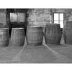 Bruichladdich Distillery, Islay.
Interior view of range of cask sizes: reading from left to right - quarter (obsolete), American barrel, hogshead, puncheon, butt.