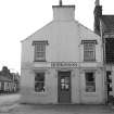 House at corner of The Square and School Street, Bowmore, Islay.
General view from North East East.