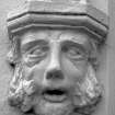 House at corner of The Square and School Street, Bowmore, Islay.
Detail of hoodmould corbel, believed to be likenesses of James Mutter.