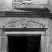 Detail of inscribed lintel over entrance doorway