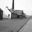 Hawick, Commercial Road, Mill with chimney
View from S