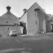 Dalmore, Distillery, Alness, used as a mining station in the First World War.
Exterior view showing kiln buildings.