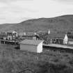 Helmsdale, Station
View of platform buildings and footbridge, from E