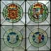 Scan of D 46531/CN. Detail of armorial panels on stained glass window in Magdalen chapel.