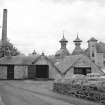 View from ENE showing SE buildings, malting kilns and maltings.