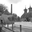 View from NNE showing stillhouse and malting kilns.