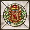 Detail of circular stained glass panel in South wall depicting lion rampant.