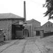 Peterculter, Paper Mill.
General view looking N-N-W showing entrance, chimney and North buildings.