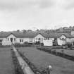 Cumnock, Greenholm Road, Weaving Factory
View from S showing workers houses