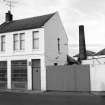 Dumfries, College Street, Shortridge Laundry
View from WSW showing shop and chimney