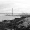 Scanned image of photograph showing Forth Road Bridge, Forth Bridge and Port Edgar, West Breakwater
View from WSW