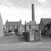 Dunfermline, 31-35 Campbell Street, Terraced Housing
View from S showing S front and Victoria Works chimney